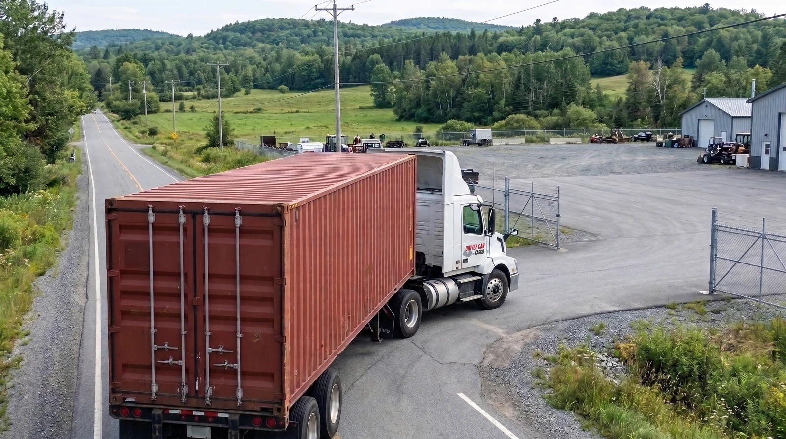 White Volvo tractor with a raised white roof fairing and a dry container.